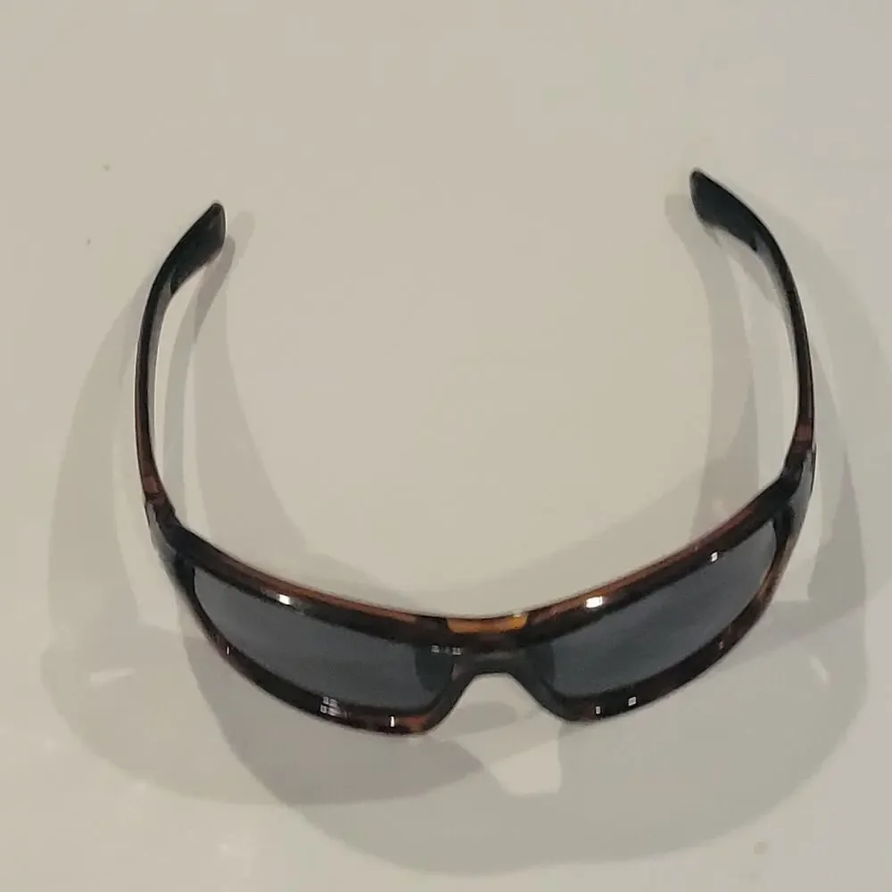 Tifosi Mast SL wrap around tortoise frame sunglasses. Unisex.